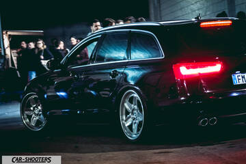 rear three-quarter, black at a night event