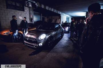front three-quarter, silver in a dark alleyway at night
