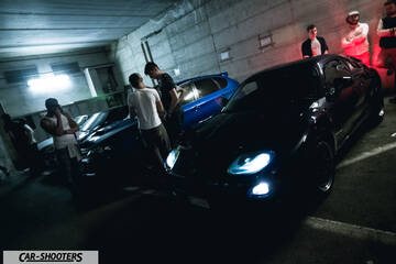 front three-quarter, black in an underground parking garage