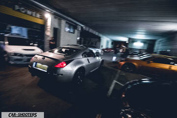 rear three-quarter, silver in an underground parking garage