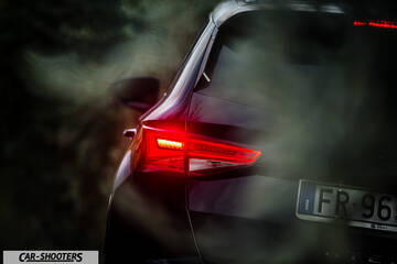 Seat Ateca – rear three-quarter, dark grey surrounded by smoke