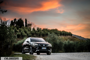 Seat Ateca – front three-quarter, black on a country road