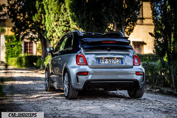 Abarth 695 Rivale – rear three-quarter, grey metallic on a gravel path
