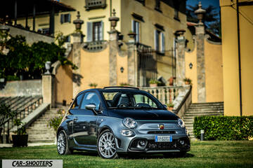 Abarth 695 Rivale – front three-quarter, grey metallic parked on a lawn