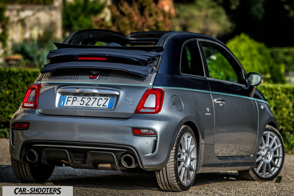 Abarth 695 Rivale – rear three-quarter, grey metallic on a gravel road