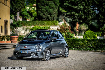 Abarth 695 Rivale – front three-quarter, grey metallic in a formal garden
