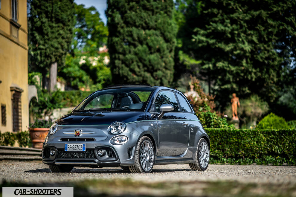 Abarth 695 Rivale – front three-quarter, grey and black in a park with trees