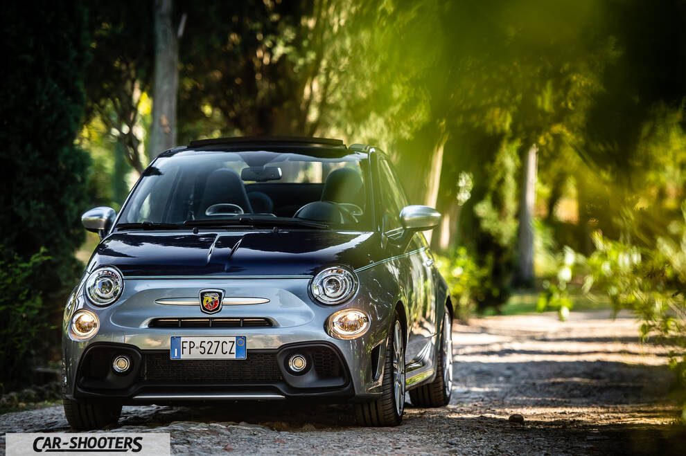 Abarth 695 Rivale – front three-quarter, silver and blue on a tree lined road