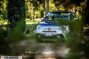 Abarth 695 Rivale – front three-quarter, blue and silver on a park path