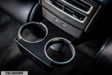 Tesla Model X – detail, rear center console cup holders