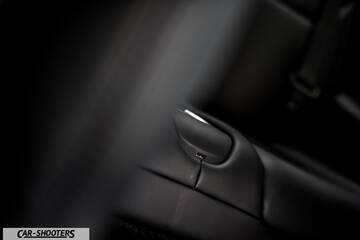 Tesla Model X – detail, seat release latch close-up