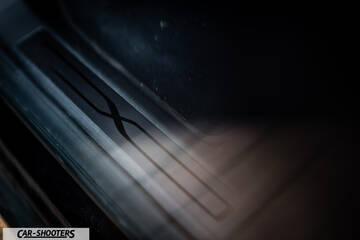 Tesla Model X – detail, door sill scuff plate close-up