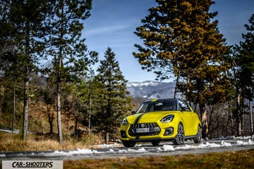 Suzuki Swift Sport – front three-quarter, yellow on a snowy country road