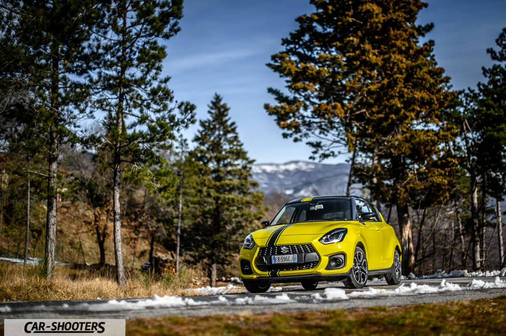 Suzuki Swift Sport – front three-quarter, yellow on a snowy country road