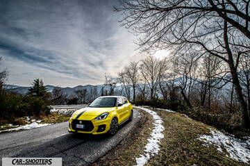 Suzuki Swift Sport – front three-quarter, yellow on a country road