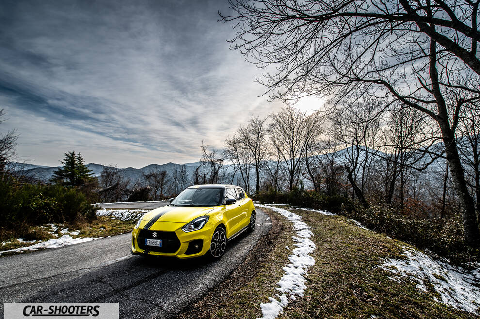 Suzuki Swift Sport – front three-quarter, yellow on a country road