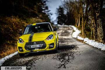 Suzuki Swift Sport – front three-quarter, yellow on a country road