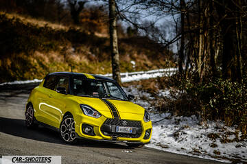 Suzuki Swift Sport – front three-quarter, yellow on a country road