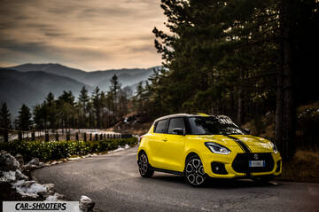 Suzuki Swift Sport – front three-quarter, yellow on a mountain road