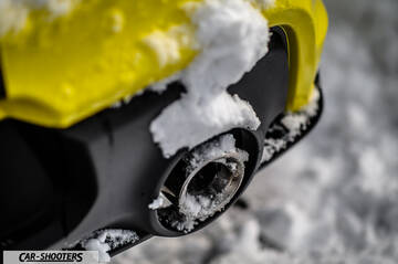 Suzuki Swift Sport – detail, exhaust tip covered in snow