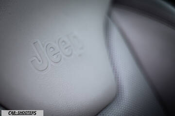 Jeep Compass – detail, embossed jeep logo close-up
