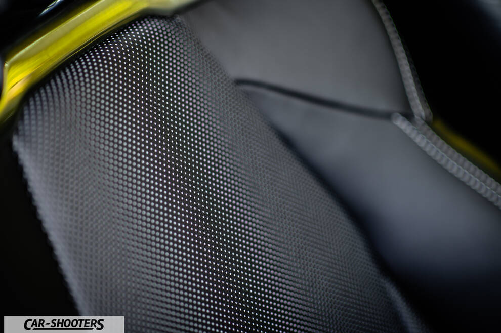 Toyota Corolla Hybrid – interior, perforated leather seat close-up