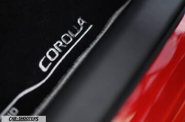 Toyota Corolla Hybrid – detail, embroidered floor mat close-up