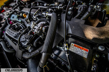 Toyota Corolla Hybrid – engine bay, close-up of engine components