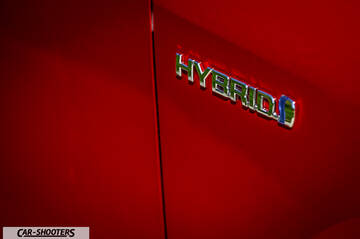 Toyota Corolla Hybrid – detail, hybrid badge close-up