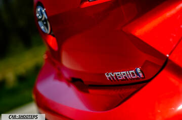 Toyota Corolla Hybrid – detail, hybrid badge close-up