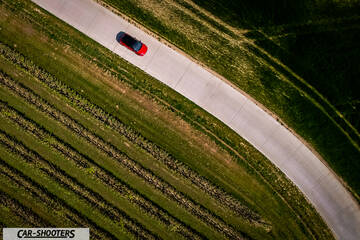 Toyota Corolla Hybrid – detail, aerial view on a road