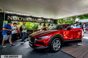 Mazda MX 5 Icon s Day – front three-quarter, red metallic at a public exhibition