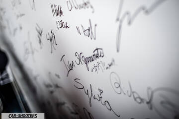detail, signed wall with signatures