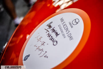 detail, with event sticker close-up