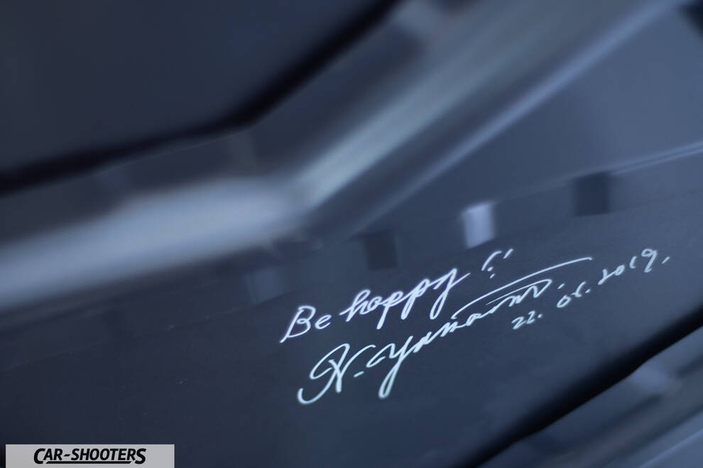 Mazda MX 5 Icon s Day – detail, signature on a dark surface