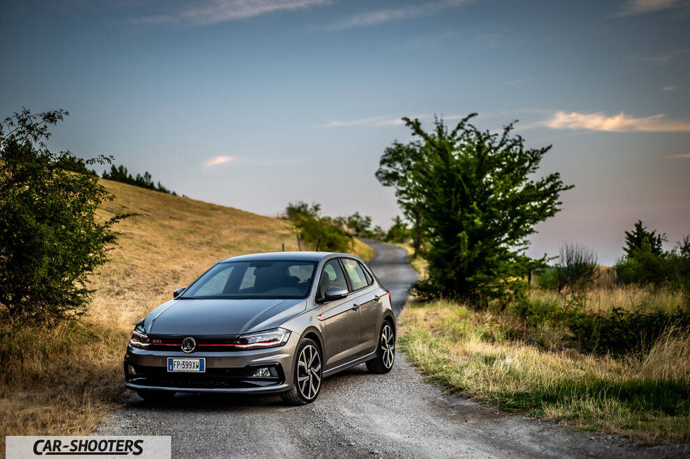 Volkswagen Polo GTI – front three-quarter, grey metallic on a country road