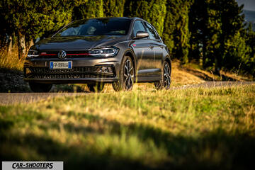 Volkswagen Polo GTI – front three-quarter, grey metallic on a country road
