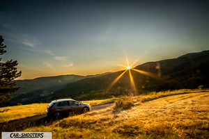 Volkswagen Polo GTI – rear three-quarter, grey metallic on a country road at sunset