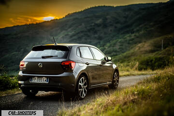 Volkswagen Polo GTI – rear three-quarter, grey metallic on a mountain road