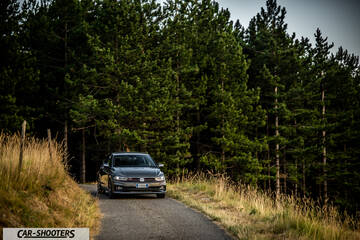 Volkswagen Polo GTI – front three-quarter, grey metallic on a country road