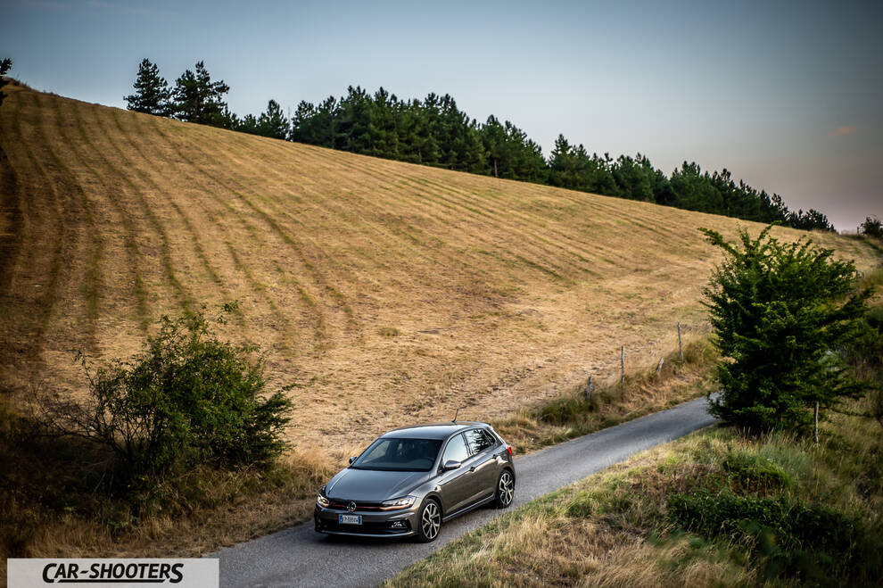 Volkswagen Polo GTI – front three-quarter, grey metallic on a country road