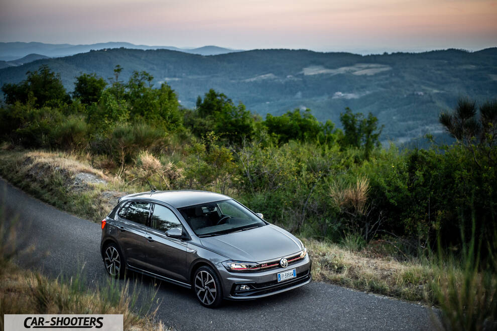 Volkswagen Polo GTI – front three-quarter, grey metallic on a country road