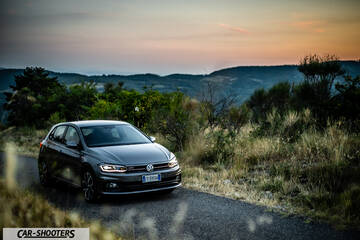 Volkswagen Polo GTI – front three-quarter, grey metallic on a country road