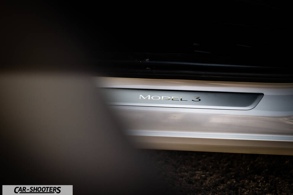 Tesla Model 3 – detail, door sill plate close-up