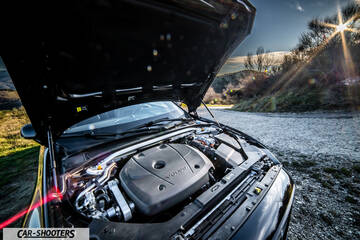 Volvo s60 polestar – engine bay, open hood with sun flare