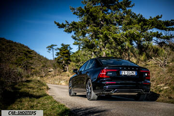 Volvo s60 polestar – rear three-quarter, black on a country road