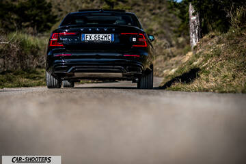 Volvo s60 polestar – rear view, black on a country road