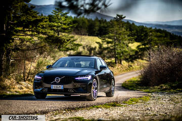 Volvo s60 polestar – front three-quarter, black on a country road