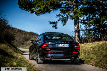 Volvo s60 polestar – rear view, black on a country road