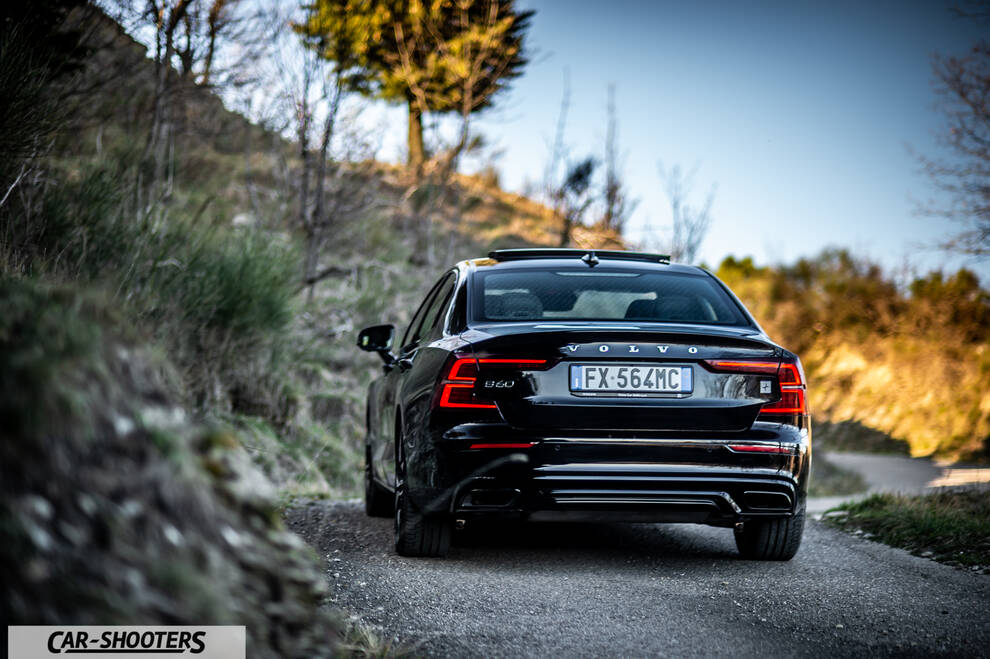 Volvo s60 polestar – rear view, black on a country road